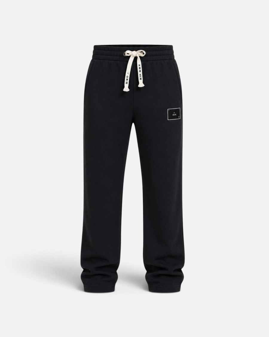 RUVR black heavyweight fleece sweatpants with elasticated waistband, Japanese-script drawstring, and woven label patch