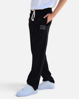 RUVR black heavyweight fleece sweatpants with a woven label patch and Japanese-script drawstring detail