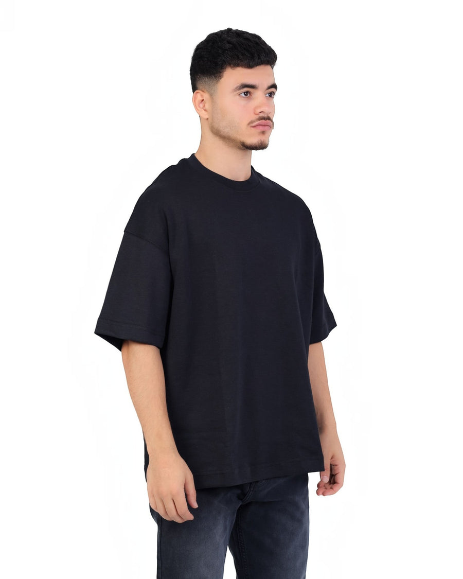 RUVR Palette Tee in black, an oversized heavyweight cotton t-shirt with a dropped shoulder and clean, unbranded face.