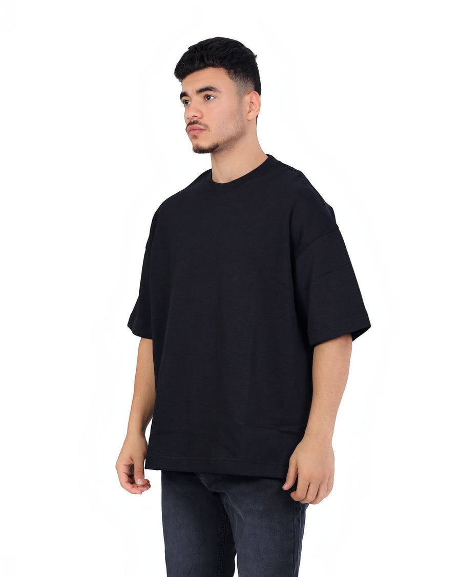 RUVR Palette Tee in black, an oversized heavyweight cotton t-shirt with a dropped shoulder and clean, unbranded face.
