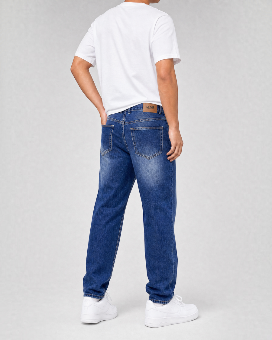 RUVR Ease Relaxed Fit Denim jeans in blue with a straight tapered leg and five-pocket design, back view