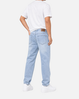 RUVR Ease Relaxed Fit Denim in sky blue with a tapered leg and 5-pocket construction, worn by a model from behind.