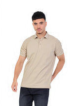 RUVR Essential Polo in beige cotton piqué with a classic collar, three-button placket, and tonal embossed emblem.