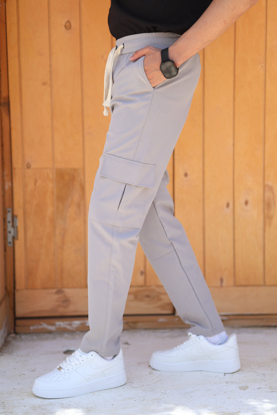 RUVR Field Cargo Pant in light grey with a relaxed wide-leg fit, elasticated drawstring waist, and side cargo pocket.