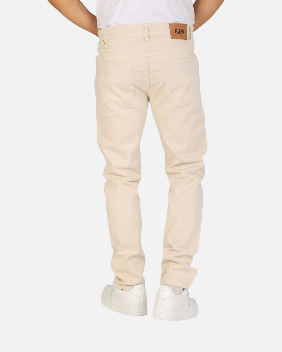 Back view of RUVR Grain Denim straight-fit jeans in beige heavyweight cotton twill with a leather brand patch.