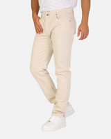Model wearing RUVR Grain Denim straight fit trousers in cream heavyweight cotton twill with five-pocket styling