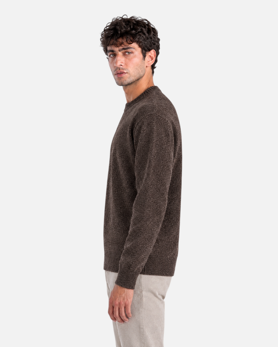 RUVR Grain brown textured knit crew neck pullover worn by a man in a side profile view.