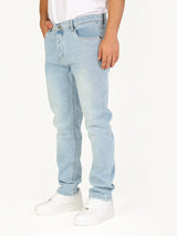 RUVR Haze Denim straight-leg jeans in a light stonewash finish with five-pocket construction and tonal stitching.