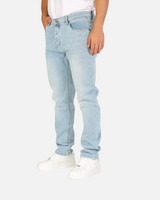 RUVR Haze Denim straight-leg jeans in a light stonewash finish with five-pocket construction and tonal stitching.