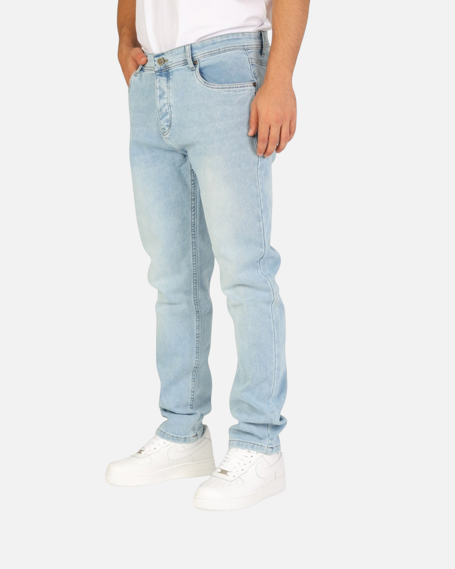 RUVR Haze Denim straight-leg jeans in a light stonewash finish with five-pocket construction and tonal stitching.