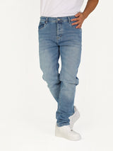 RUVR Haze Denim straight-leg jeans in a light stonewash blue cotton with five-pocket styling and tonal stitching.