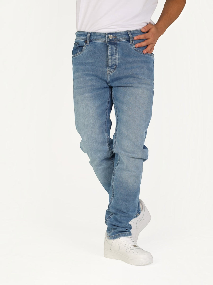 RUVR Haze Denim straight-leg jeans in a light stonewash blue cotton with five-pocket styling and tonal stitching.