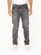 RUVR Haze Denim straight-leg jeans in a grey stonewash finish with five-pocket construction on a model