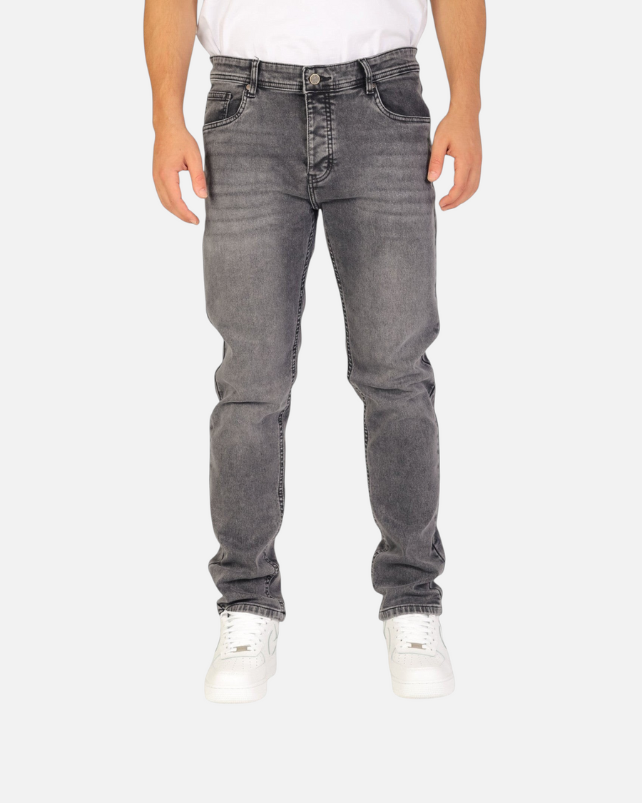 RUVR Haze Denim straight-leg jeans in a grey stonewash finish with five-pocket construction on a model