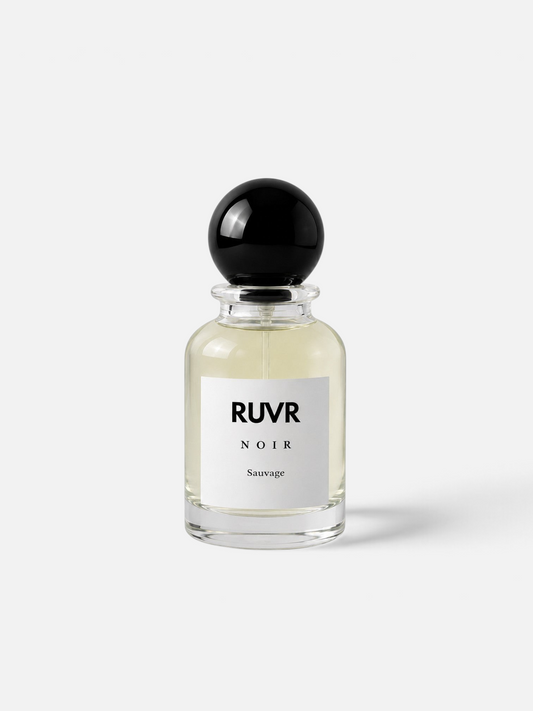 RUVR NOIR Sauvage 55ml eau de parfum in a clear glass bottle with a round black cap, featuring woody and spicy notes.
