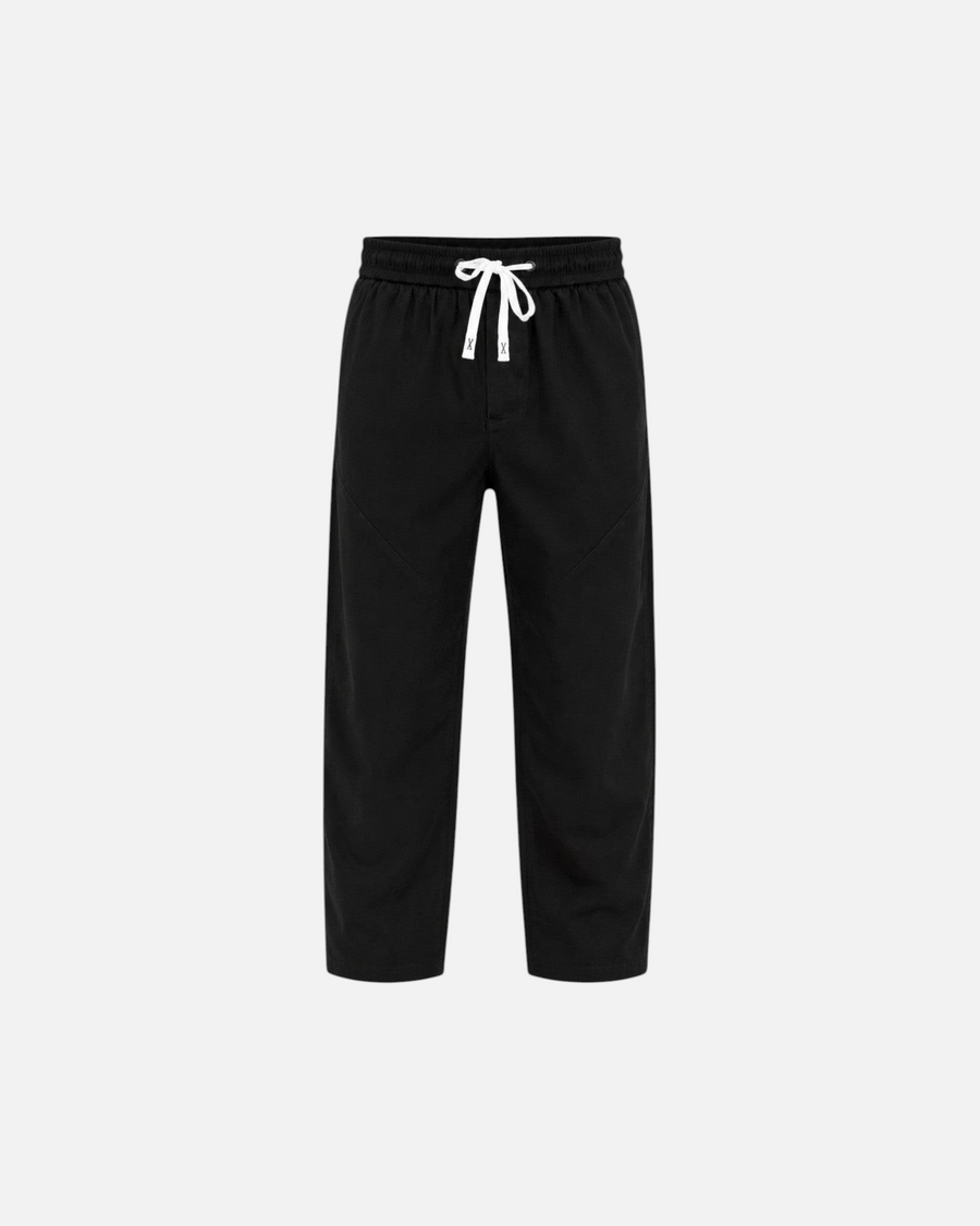 RUVR Urban Utility Pants in black with a relaxed fit, elastic waistband, and white adjustable drawstring.