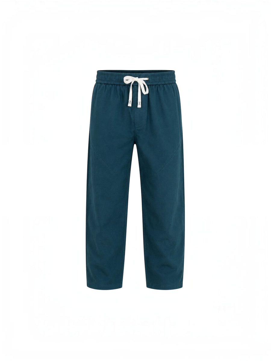 RUVR Urban Utility Pants in dark teal with an elastic drawstring waistband and a relaxed modern fit
